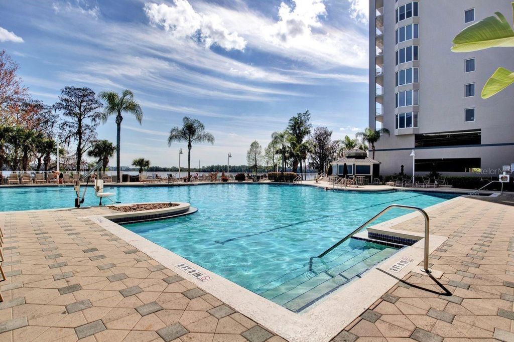 Photo of 13415 Blue Heron Beach Drive #106, Orlando, FL 32821 (MLS # O6394691)