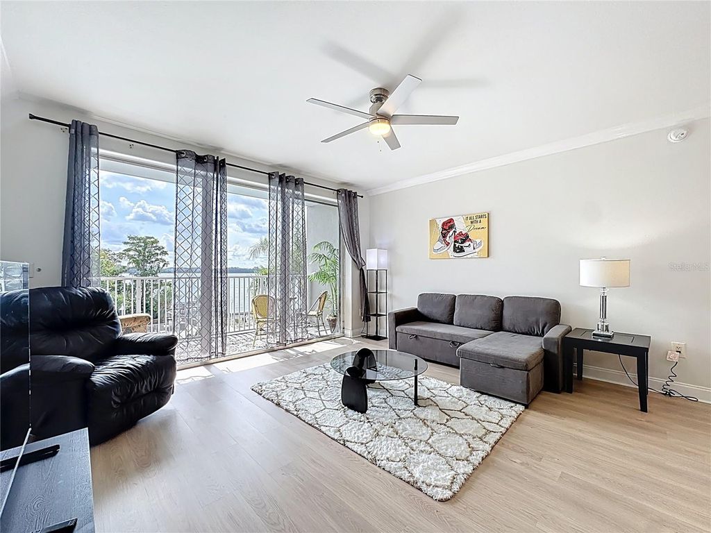 Photo of 13415 Blue Heron Beach Drive #106, Orlando, FL 32821 (MLS # O6394691)