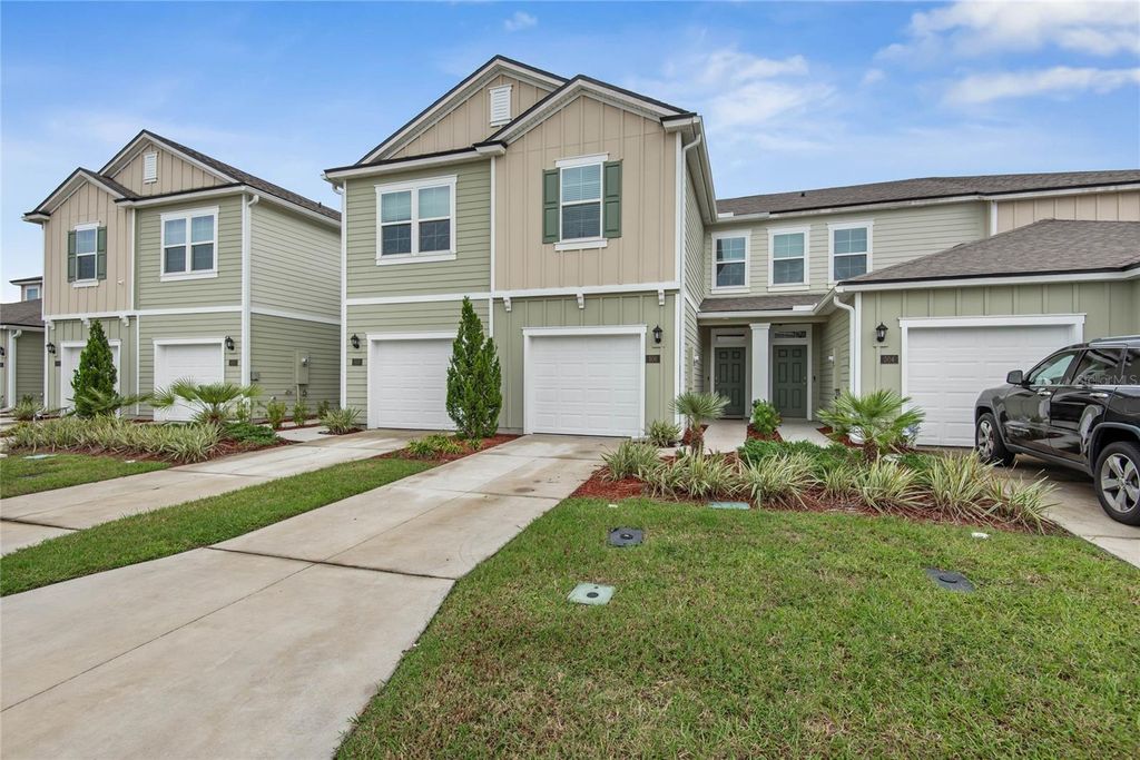 Photo of 506 Redbud Road, Palm Coast, FL 32137 (MLS # FC313180)