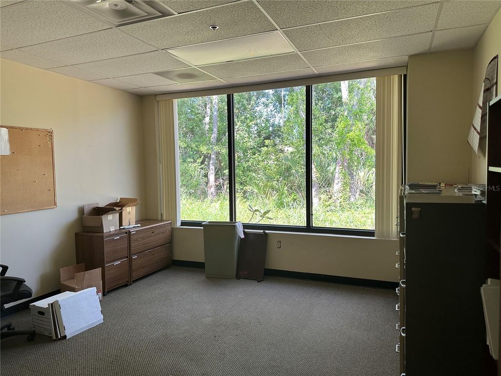 Photo of 5620 W Sligh Avenue, Tampa, FL 33634 (MLS # W7877017)