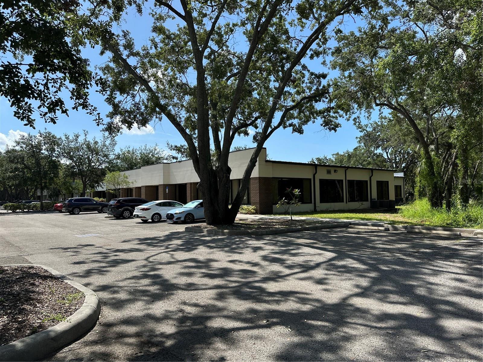 This 12,246± SF office/warehouse property is available for sale or lease and offers flexibility for both investors and owner-occupants. Suite A, totaling approximately 6,304 SF, is currently available and ideal for an owner-user, with the potential to add an overhead (OH) door to increase functionality. Suite B, 5,942 SF, includes a small warehouse component with an existing OH door and is occupied by a long term tenant. Both suites feature spacious conference rooms, breakrooms, multiple sets of restrooms, and high-quality office finishes, including oversized hurricane-rated windows. The property also offers 43 parking spaces and enjoys a central location with quick access to the Suncoast Parkway.