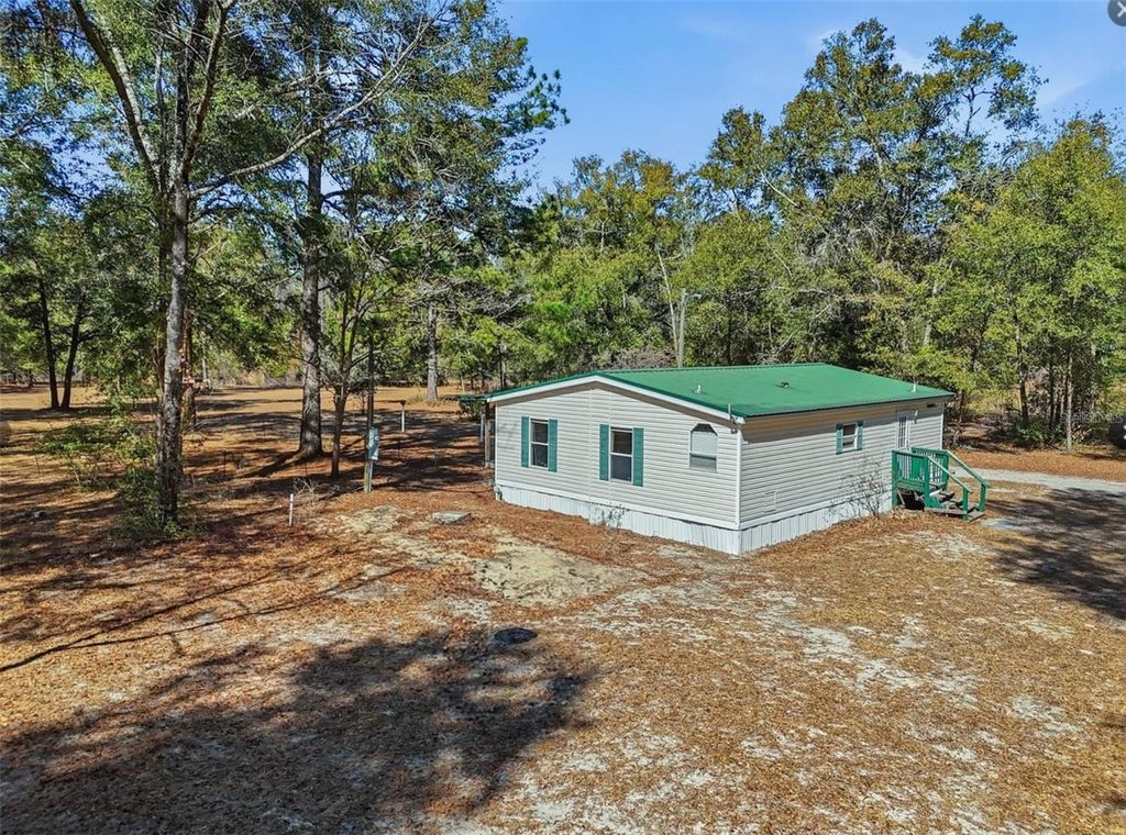 Photo of 998 SW Spruce Road, Fort White, FL 32038 (MLS # GC537545)