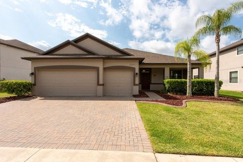 Photo of 12352 Crestridge Loop, New Port Richey, FL 34655 (MLS # TB8383107)