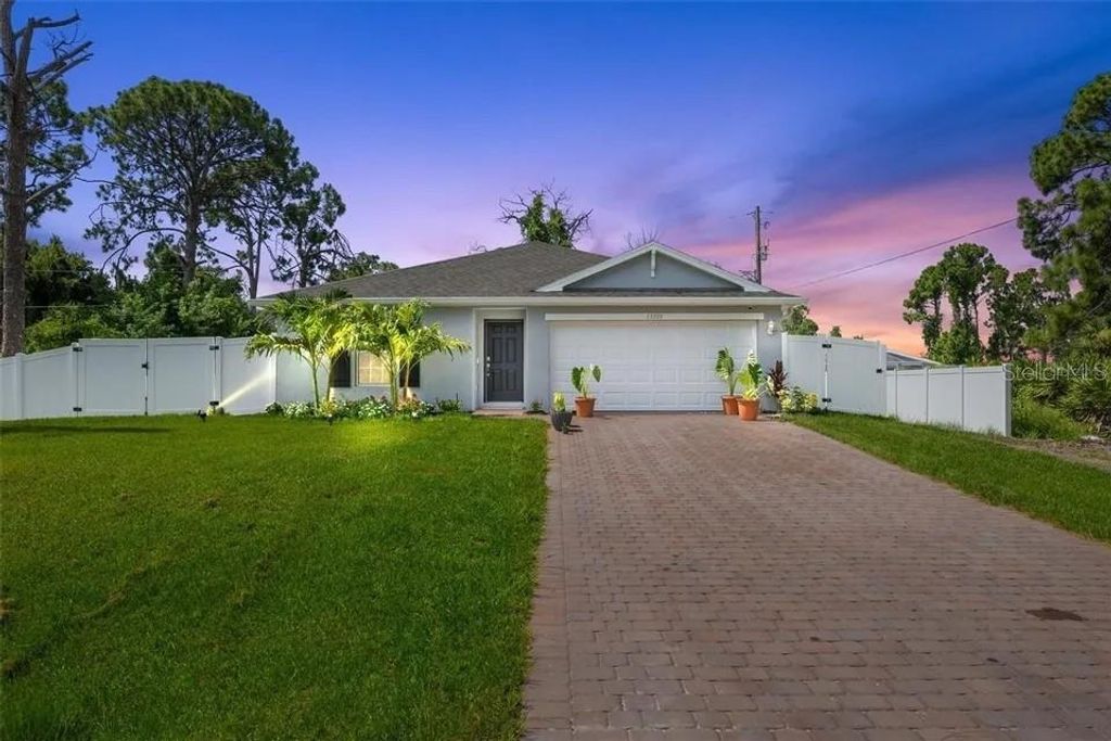 Photo of 13339 Flaherty Avenue, Port Charlotte, FL 33981 (MLS # D6144035)