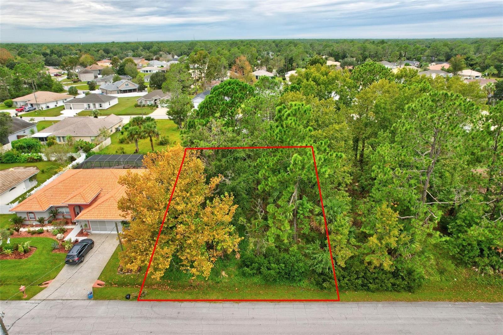 This beautiful vacant lot in the heart of Palm Coast, Florida could be your future homesite. It's conveniently located to areas of shopping, golf courses, grocery stores, hospitals, restaurants, schools, walking trails, and of course, our beautiful beach. There is no HOA, no required timeframe to build, and you can pick any builder. It's also located between St. Augustine and Daytona Beach and just about an hour away from Orlando. It's a great location at a great price. Drive by or call me today to see your future homesite!