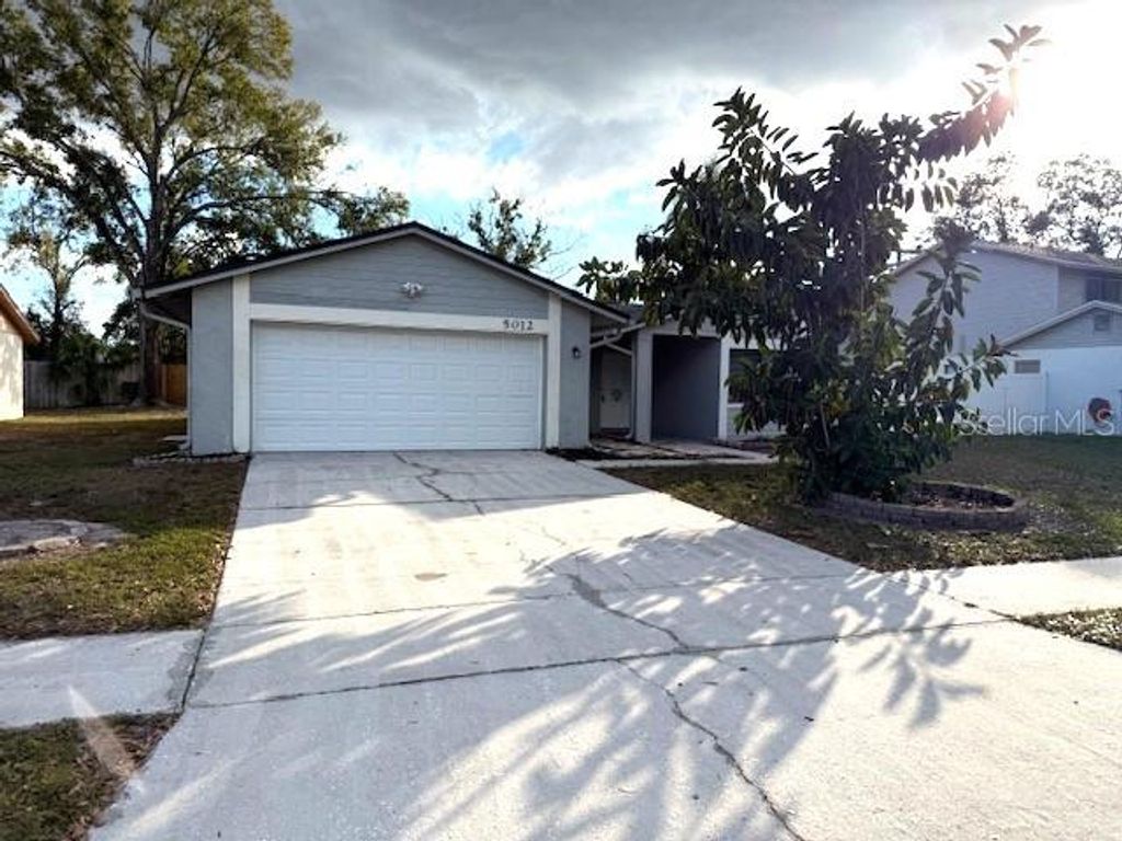 Photo of 5012 Country Hills Drive, Tampa, FL 33624 (MLS # TB8463070)