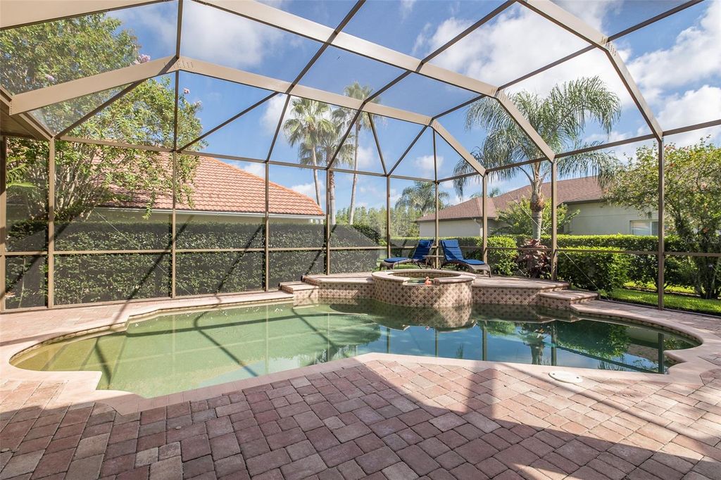 Photo of 1444 El Pardo Drive, Trinity, FL 34655 (MLS # W7878345)