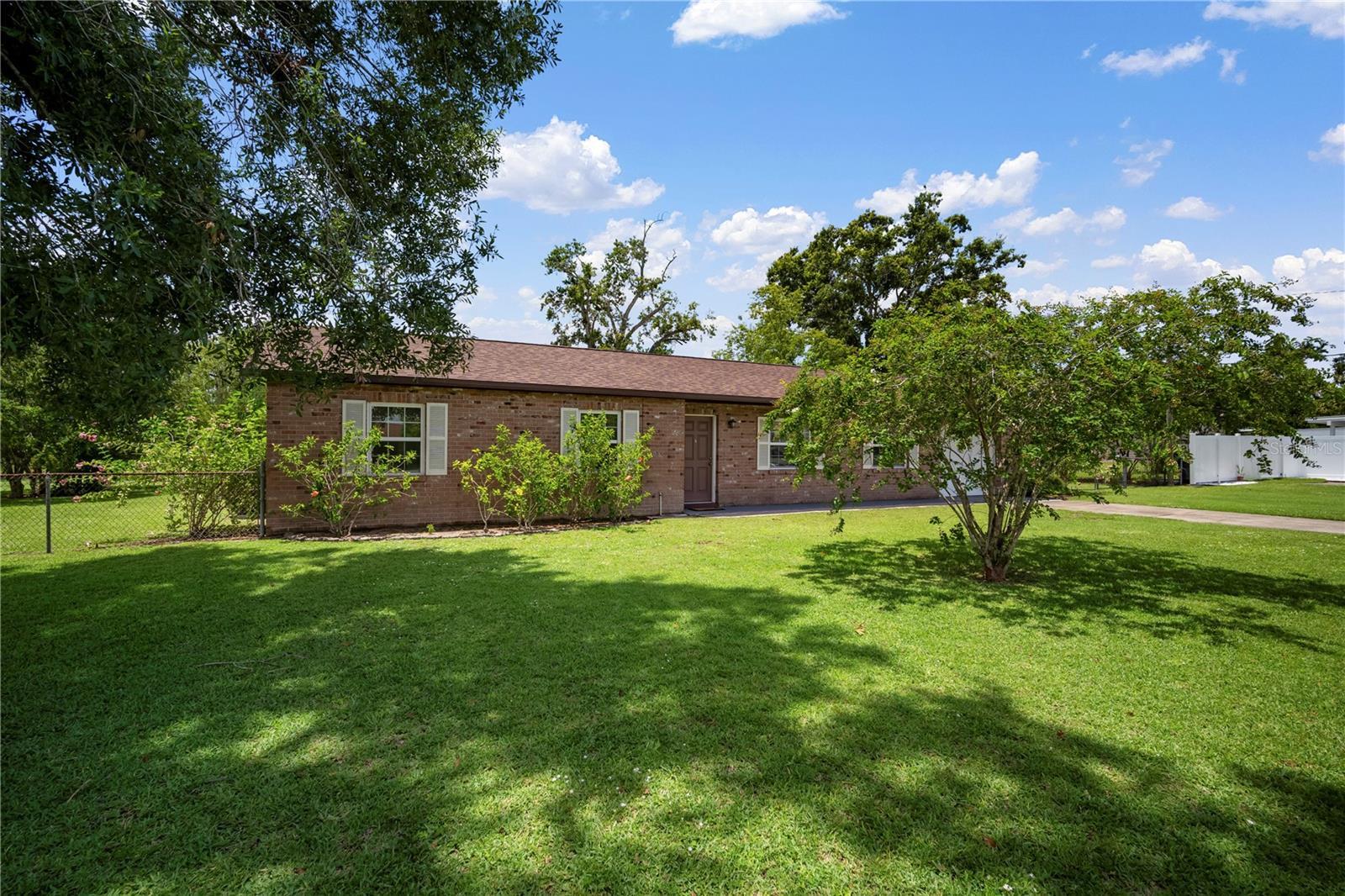 BRAND NEW ROOF AND OVERSIZED BARN! Land lovers, this one's for you! Fantastic three-bedroom, two-bath home which sits right under an acre in a much sought-after neighborhood in Brandon, south of 60. The beautiful brick exterior immediately catches your attention. One minute to the Saladino dog park. Very close to Brooker Elementary and Burns middle school. No HOA. Bring your boat or your camper and save on those storage fees. Enjoy the security of having a half-acre fenced in! The opportunities are unlimited with property. This home is move-in ready and awaits its new owners. Minutes to the crosstown parkway. MacDill AFB is 22 miles away.