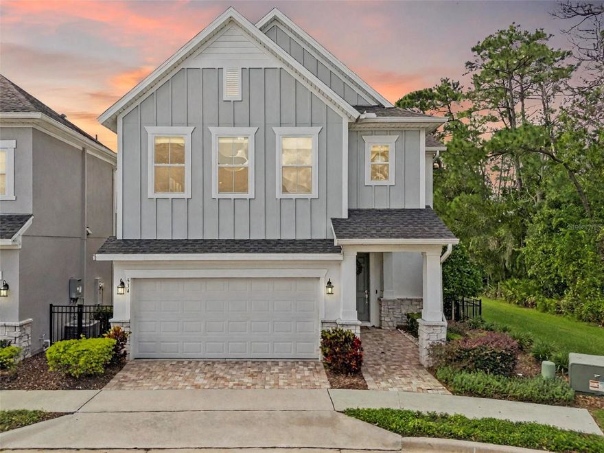 LOCATION LOCATION! Welcome to this exceptional CUSTOM-BUILT David Weekly home, nestled in the HIGHLY COVETED Griffin Park GATED Community in Lake Mary. Completed in 2021, this residence is a TRUE MASTERPIECE, ideally situated on a PRIME CORNER LOT that offers an abundance of NATURAL LIGHT and unparalleled PRIVACY. Surrounded by a SERENE CONSERVATION AREA and offering views of a TRANQUIL POND with a SOOTHING FOUNTAIN, you’ll enjoy the luxury of having NO REAR NEIGHBORS. The home’s welcoming pavered entryway leads you into an INVITING FOYER, which opens to an expansive OPEN-CONCEPT living space. The rich LUXURY VINYL PLANK FLOORING flows seamlessly throughout, creating a cohesive and sophisticated atmosphere. At the heart of the home is the GOURMET KITCHEN, designed for both beauty and functionality. Featuring expansive HIGH END CABINETRY, gleaming Cambria QUARTZ COUNTERTOPS, a striking herringbone TILE BACKSPLASH, and a NATURAL GAS STOVE, this kitchen is every CHEF'S DREAM. The standout feature is the LARGE CAMBRIA QUARTZ CENTER ISLAND with elegant blue veins, complemented by a Belfast sink with gold finishes, elevating the kitchen to a level of opulence. Large windows adorned with custom HUNTER DOUGLAS WINDOW TREATMENTS bathe the home in natural light, enhancing the spacious feel and highlighting every detail. The first floor also includes a CONVENIENTLY LOCATED HALF BATH, ensuring comfort for both residents and guests. Upstairs, enjoy UPGRADED HIGH CEILINGS, recessed lighting, and a thoughtfully designed floor plan featuring three bedrooms, a SPACIOUS LOFT, and an EXPANSIVE LAUNDRY ROOM. The primary suite is a true retreat, offering ample space for oversized furniture and a cozy lounge area. It includes a LARGE WALK-IN CLOSET and a luxurious ensuite bathroom, complete with a double-sink vanity, a Jacuzzi soaking tub, and a separate glass shower finished with herringbone tile flooring. Residents of Griffin Park enjoy a MAINTENANCE-FREE LIFESTYLE, with the HOA covering all landscaping and grounds maintenance. The community offers an array of amenities, including an OLYMPIC-SIZED SWIMMING POOL with cabanas, a DOG PARK, a LEGACY LAWN FIRE PIT, and a SCENIC WALKING TRAIL. Two car garage with CUSTOM STORAGE RACKS! Convenience is key, as shopping, dining, fitness centers, and medical facilities are just moments away at GRIFFIN FARMS. This SOUGHT-AFTER LOCATION provides access to Seminole County Schools, nearby universities, and popular local attractions. The vibrant town of Lake Mary offers a weekly Farmers Market in the picturesque Central Park, as well as a host of community events in the charming Historic Downtown. With easy access to major highways, commuting is a breeze. Don’t miss the opportunity to experience this beautiful home for yourself. Contact us today to schedule your private tour!