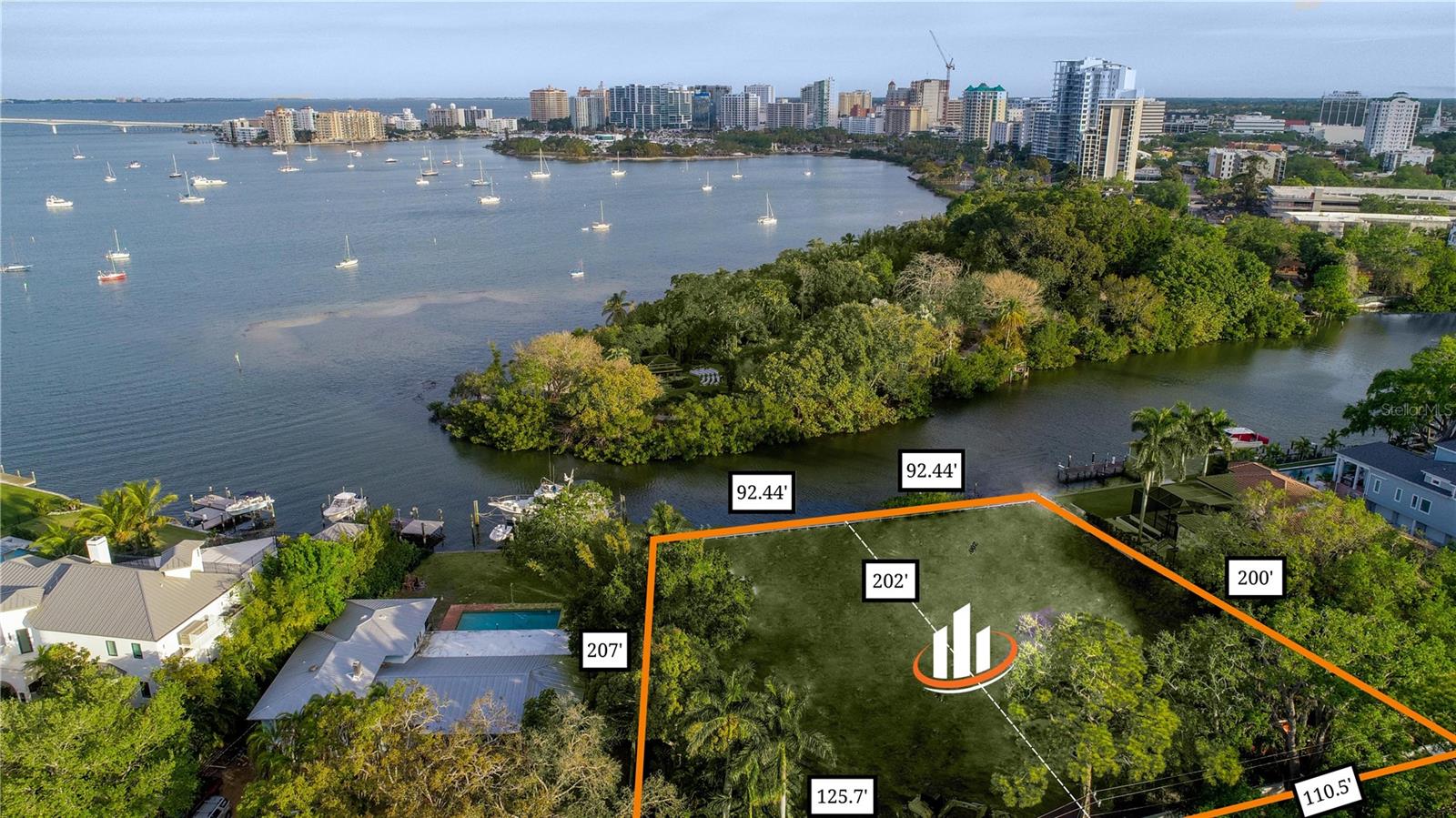 One or more photo(s) has been virtually staged. This may be one of your final opportunities to build your dream home in one of the most exclusive waterfront areas West of Trail neighborhoods. These properties have breathtaking views of Sarasota Bay. Both lots are available at $4,950,000 each. They are +/- 20,000 square foot lots on deep protected water where Hudson Bayou meets Sarasota Bay. The property is in the highly popular neighborhood of Bay Point Park and has beautiful views of Selby Gardens, the lights of the City, the Ringling Bridge, the Bayou, and the Bay. The neighborhood is just minutes away from Downtown Sarasota, Southside Village, St. Armand’s Circle, and our areas beautiful beaches.
Dynan Construction is a Custom Home Builder in Sarasota, Florida that works closely with their clients to create one-of-a-kind homes that fit perfectly and work exquisitely. Dynan has constructed many 5-star residences in the immediate area; Each of which was designed, crafted, and built with extraordinary care. Their homes are personal, intimate and a complete and joyous expression of the desires of each and every client. They specialize in delivering a turnkey product to clients, managing all phases of the construction process, from site work and land development to construction and delivery. They would be honored to be the proud Home Builder for your new Residence.