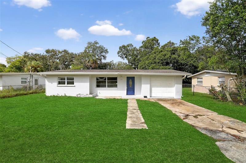 Spacious and updated 4 bedroom/2 bathroom POOL home with a 1-car garage in Daytona Beach! Fantastic location- Only minutes from all your conveniences, shopping plazas, multiple restaurants, entertainment and activities in popular Downtown Daytona, and only a short 10-minute drive to the beautiful World Famous Daytona Beach! NEW Interior and exterior paint, NEW vinyl flooring throughout. Kitchen has granite countertops, stainless-steel range and refrigerator included, and plenty of cabinet space. Additional living space/family room in the back with a gorgeous stone fireplace and double doors that open onto the back patio with a large, glistening blue pool- perfect for those Hot Florida Summers if you don't want to drive to the beach! 2017 Roof, Newer HVAC and water heater. Perfect for big and small families ready to enjoy east-coast living in Daytona Beach! Schedule a showing now!