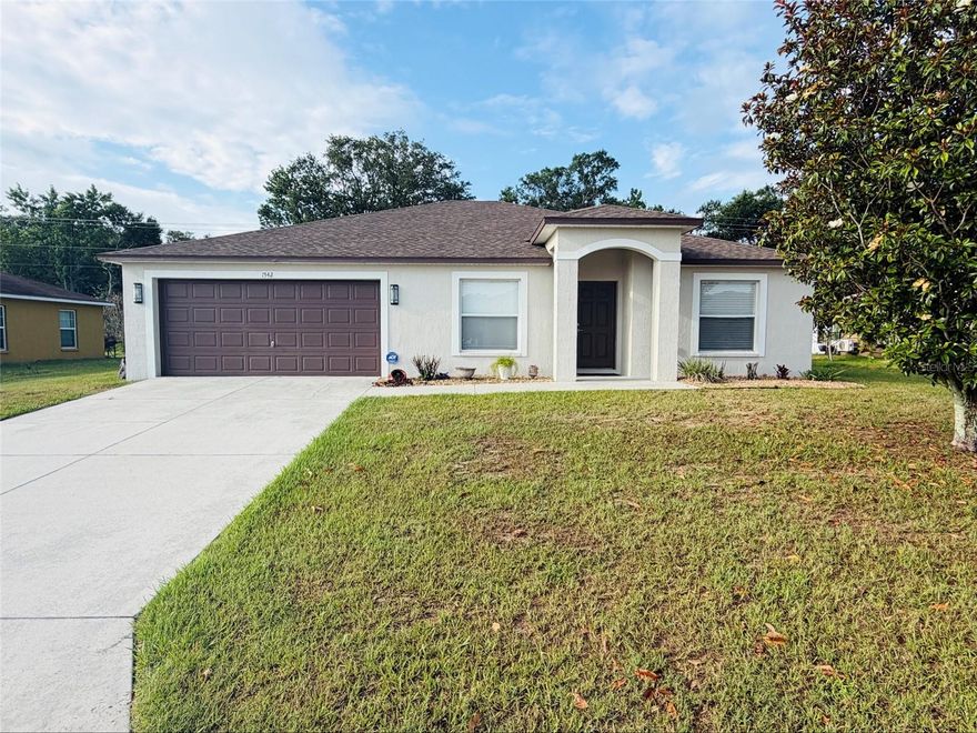 Welcome to this spacious 4-bedroom, 2-bath rental home in beautiful North Lakeland! This custom-built home is located in an established neighborhood that offers a true sense of community. Inside, you'll find an open-concept layout with high ceilings, creating a bright and inviting atmosphere perfect for both everyday living and entertaining. The updated kitchen features granite countertops, solid wood cabinets, an oversized island, and a high bar ideal for casual dining. The home includes wood flooring in the kitchen and bathrooms, with tile and laminate flooring throughout the remaining areas for easy maintenance. Enjoy the convenience of a two-car garage and a large, fully fenced backyard situated on a 10,000-square-foot lot—perfect for outdoor activities, gatherings, or relaxing. Ideally located near shopping, dining, parks, and major roadways, this home offers the perfect combination of comfort, space, and convenience. Schedule your showing today!