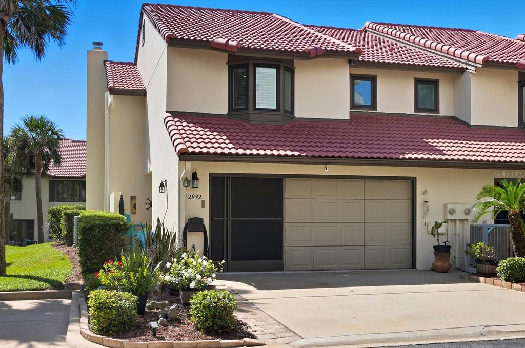 Photo of 2942 Sea Oats Circle, Daytona Beach, FL 32118 (MLS # V4946454)