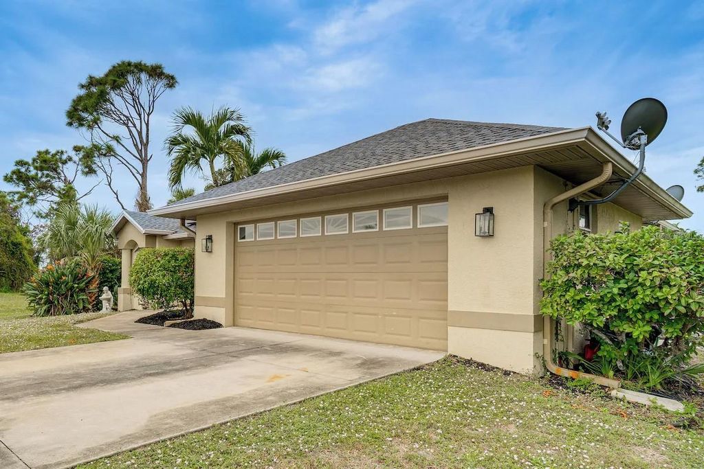 Photo of 289 W Pine Valley Lane, Rotonda West, FL 33947 (MLS # D6147039)