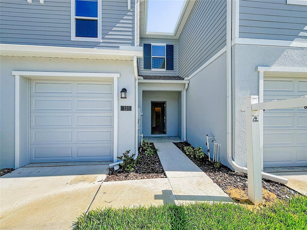 Photo of 331 Sol Vista Dr, Dundee, FL 33838 (MLS # O6433820)