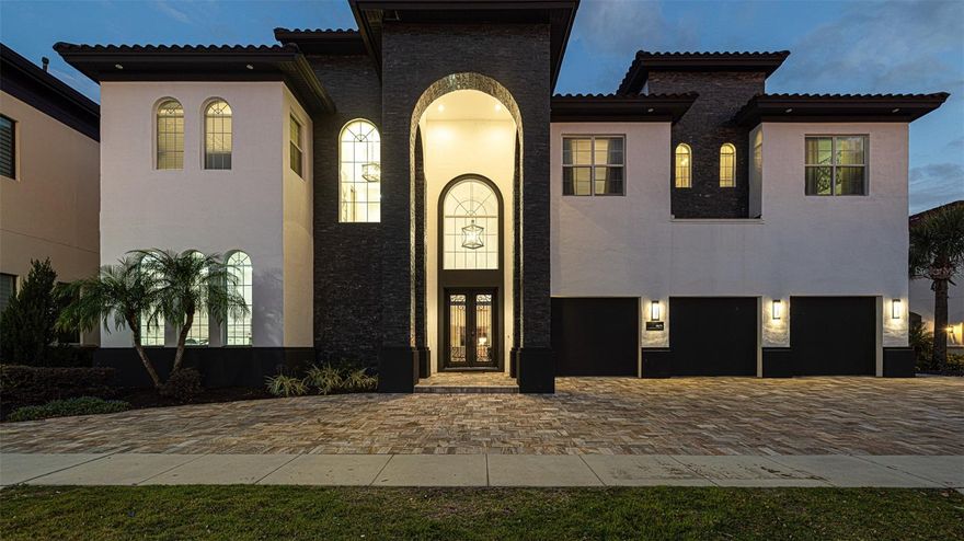 FINANCING AVAILABLE. Presenting this stunning FULLY FURNISHED custom estate home located in the luxury REUNION RESORT. Perfect for both family and guest entertaining and/or to use as a revenue-generating investment property. Ideally situated on the 6th hole of the Jack Nicklaus designed Tradition golf course, this 11,027 sqft property has been NEWLY REMODELED with over $800,000 in brand new UPGRADES. Design features are a bound and include a CUSTOM high gloss gourmet kitchen with quartz countertops, large central island and spacious walk-in pantry. New contemporary flooring, added custom cabinetry, freshly painted and decorated, and adorned with new modern furniture and lighting, this residence is a dream. Upon arrival, a high ceiling entryway opens to the foyer and living/great room areas with large sliding doors framing picture perfect views. Designed to accommodate large gatherings, there are several indoor and outdoor lounge and dining areas as well as multiple newly designed entertainment spaces. Enjoy fun times in the “CASINO ROOM” with countertop bar and decked out with cutting edge digital slot machines or in the newly themed “ARCADE ROOM” jam packed with a wide variety of electronic games. Take the residential elevator or climb the sweeping staircase to access the ultimate “MULTIMEDIA EXTRAVAGANZA” area – this unique open-concept living space consists of an impressive 8 player roulette wheel, slot machines and home theater with surround sound system and luxury theater seating for 12. Enjoy movie night with popcorn, snacks and a beverage prepared upstairs as the residence has a secondary kitchen/bar area as well as an additional family room and further dining seating. There is an upper balcony area which provides an additional vantage point to avail of the PANORAMIC FAIRWAY VIEWS and spectacular sunsets. Additional rooms in the home include a fully equipped fitness gym and a private spa with sauna and steam shower. Each of the 11 luxurious bedrooms have ensuite bathrooms and are well appointed in size with two professionally themed masterpieces sure to impress – the Jurassic Park room sleeps 5 and showcases a life-size dinosaur head and custom jeep vehicle-bed whilst the Steamboat Willie Mickey Mouse room has bunkbeds which sleep 8. Enjoy Florida living at its finest with sliding doors from the family room giving access to the covered lanai featuring automatic retractable screens providing a wonderful indoor/outdoor living experience. Be enticed to relax by the heated sparkling pool which features a beach entry point, spa and fountain. There is a full BBQ kitchen with plentiful dining space, casual countertop seating as well as an inviting lounge area with two-sided fireplace. An ACTIVE TRANSFERRABLE MEMBERSHIP grants access to the many amenities of the Reunion Resort with its three world class golf courses (designed by Arnold Palmer, Tom Watson and Jack Nicklaus), a golf academy, Clubhouse at The Bear’s Den, six onsite restaurants, twelve community swimming pools, a multimillion-dollar water park, six Har-True tennis courts, pickleball, bocce ball, volleyball, crazy golf, a playground, and full-service salon and spa. Reunion is only a couple of miles away from Walt Disney World Resort, Seaworld and Universal Studios. Don’t miss out, make this your main home, secondary home or income generating investment property today! Video: https://vimeo.com/795944559