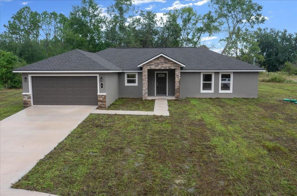 Photo of 3 Malauka Radial Track, Ocklawaha, FL 32179 (MLS # OM707454)