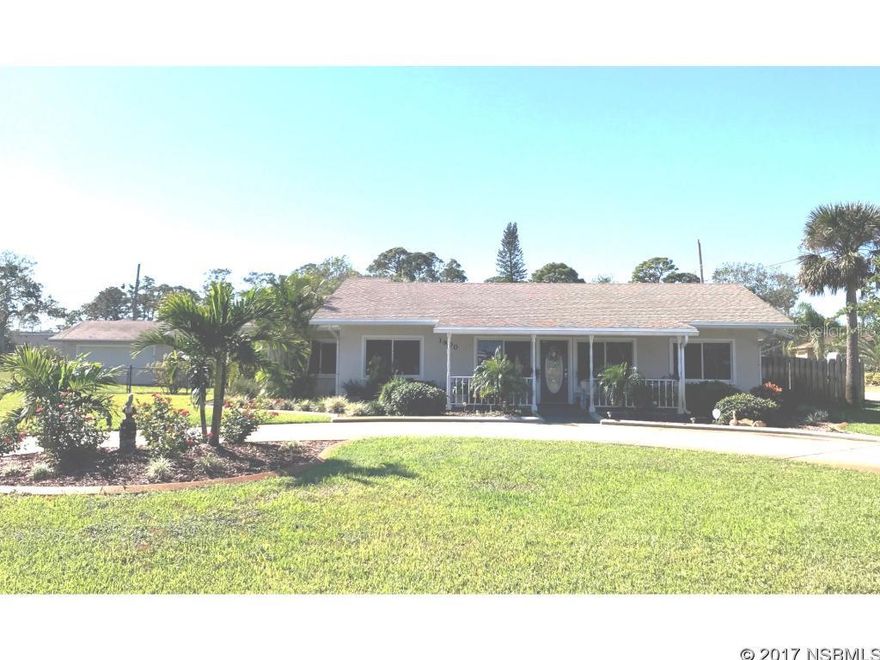 Enjoy being able to do "the Riverwalk" each morning and afternoon and sitting on your front porch enjoying the river views and breezes from this lovely 3 br/2 bath block home with detached double garage/workshop.  There is charm galore in this updated block home--wood floors in the family room w/corner fireplace and guest bedrooms, French door entry into the den from the formal living area and also out to the spacious back porch overlooking the fully fenced yard.  The oversized 137x150 lot w/circular driveway allows plenty of room for parking RV's and boats too.  This home has been lovingly maintained and shows TLC throughout. ;Water: City