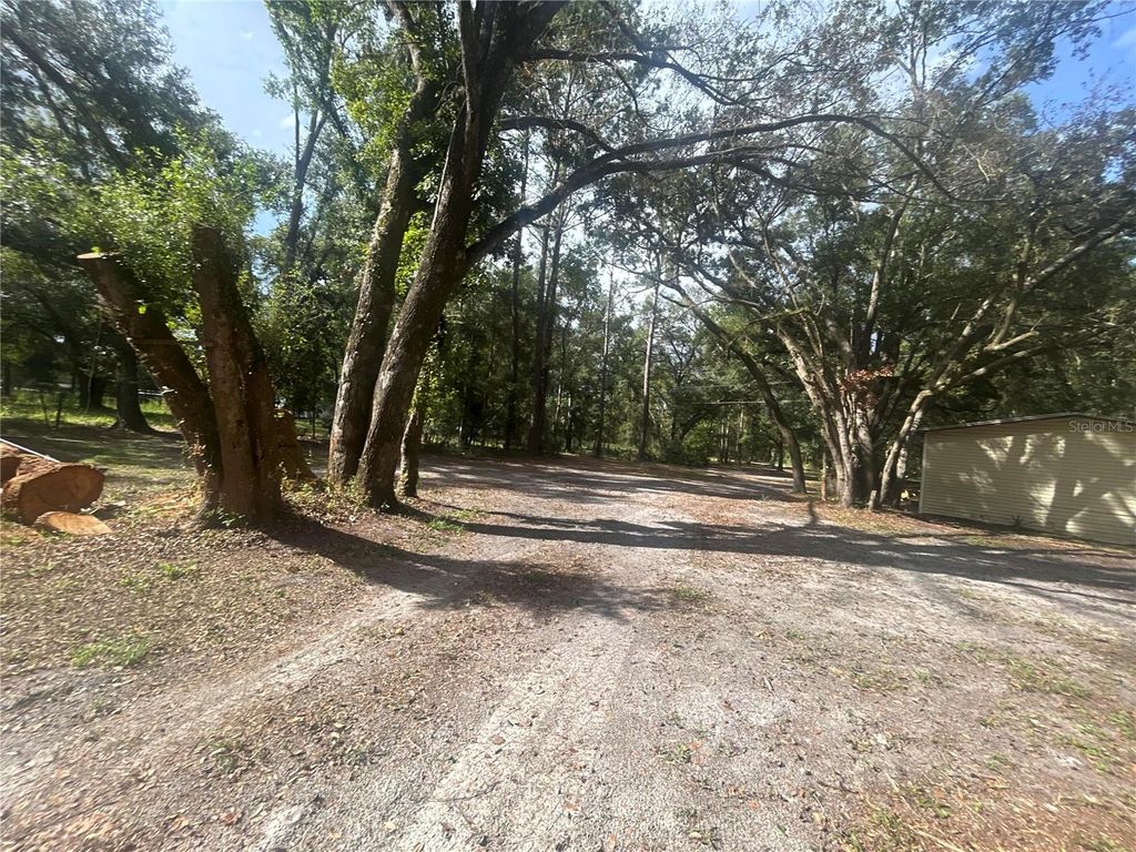 Photo of 14215 97th Road, Live Oak, FL 32060 (MLS # O6391335)