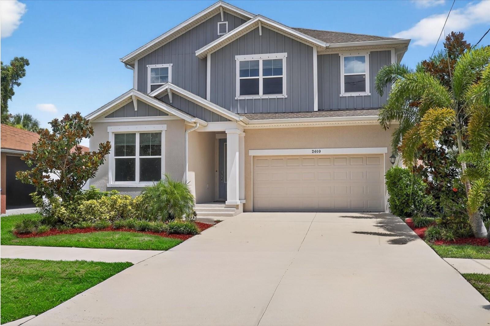 One or more photo(s) has been virtually staged. Welcome to 2409 W. Gray St. Built in 2021, this stunning Craftsman-inspired home offers 4 bedrooms + office, 3 full baths, an upstairs bonus room, and 2,691 sq ft of thoughtfully designed space—ideal for modern living—all located in South Tampa’s top-rated Mitchell / Wilson / Plant school district.
At the heart of the home is a sprawling, showpiece kitchen with an oversized island, quartz countertops, white cabinetry, stainless steel appliances, built-in oven, dry bar, and walk-in pantry—designed to impress and built for functionality. Downstairs includes a full guest suite and a light-filled office (or optional 5th bedroom) with French doors.
Upstairs, the enormous primary suite features a soaking tub, walk-in shower, dual vanities, and two large walk-in closets—one of which offers direct access to the laundry room. Two additional bedrooms and a generous bonus room round out the second floor.
Solar-equipped, the home keeps monthly electric bills around just $175. Additional features include a mudroom off the garage with custom shiplap trim, a 2-car garage with epoxy-coated floors, full irrigation system, and a turfed backyard with covered lanai for easy, low-maintenance outdoor living.
All just 8 minutes to Downtown, 10 to the airport, and 5 to Whole Foods and Midtown. A standout home in a prime South Tampa location.