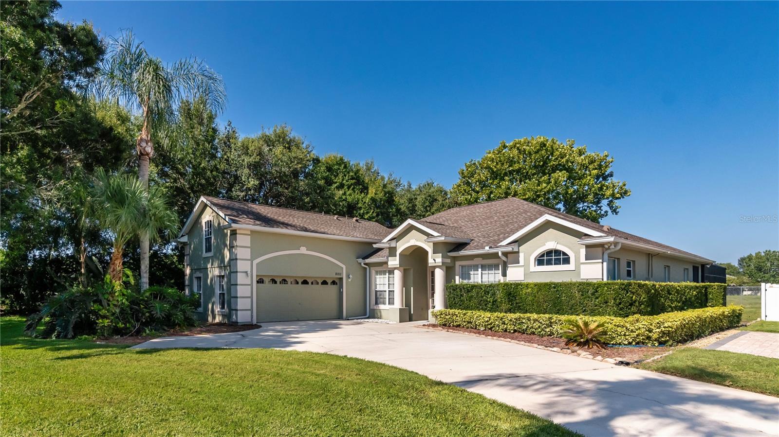 Excellent value on this 4BR pool home in the desirable Marblehead community. Room for everyone and everything! Step inside to open great room with built-in shelving and triple sliding door that provides direct access to the pool deck – makes a great gathering space. Kitchen boasts granite counters, expansive breakfast bar, an abundance of storage space and eat-in nook overlooking the pool. Formal dining room in the front of the home is available for when you need to seat a crowd. There’s also a bonus room off the front entry – ideal for use as a home office. Split bedroom plan with primary suite on the ground floor on one side – ideal for privacy. Here you’ll enjoy a huge bedroom, poolside views (w/direct access to the deck) and an ensuite contemporary bath. Two bedrooms are tucked off the home’s hallway near the kitchen – you’ll be impressed with their size - and the full bath here has convenient access to the pool. Upstairs is the fourth bedroom/full bath which could serve as a secondary primary suite. You could also set up this area as a secondary entertainment spot – very versatile space. Another reason to want to own this home is all that you have out back – pristine pool under screen enclosure with both covered and open patio space. With no direct rear neighbors and neighboring fencing, you have plenty of privacy for enjoying your fun in the sun. Great location – Marblehead is a community of well-maintained homes, and less than 10 minutes from essential shopping in Dr. Phillips or access to SR 408. You’ll love living here. Come see all that this home has to offer!