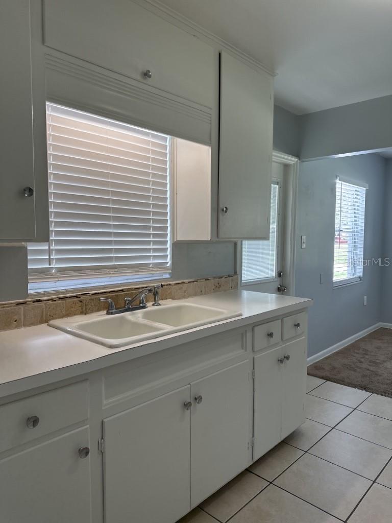 AYALAS ADD TO WELLSWOOD - Residential