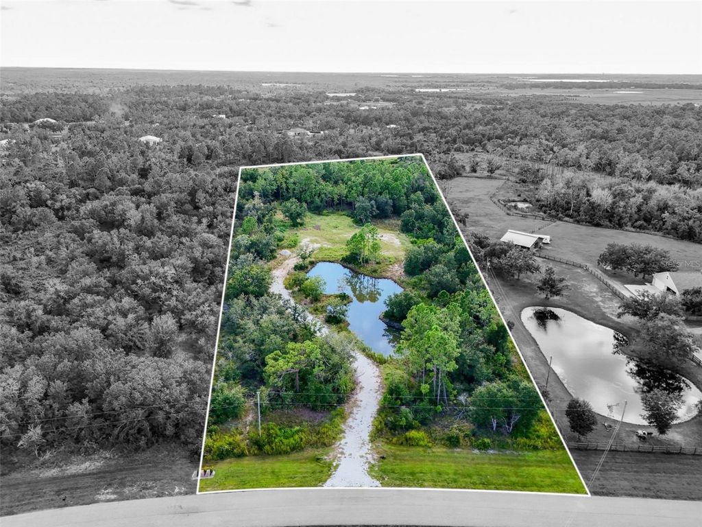 Photo of 40120 20th Place E, Myakka City, FL 34251 (MLS # A4666000)