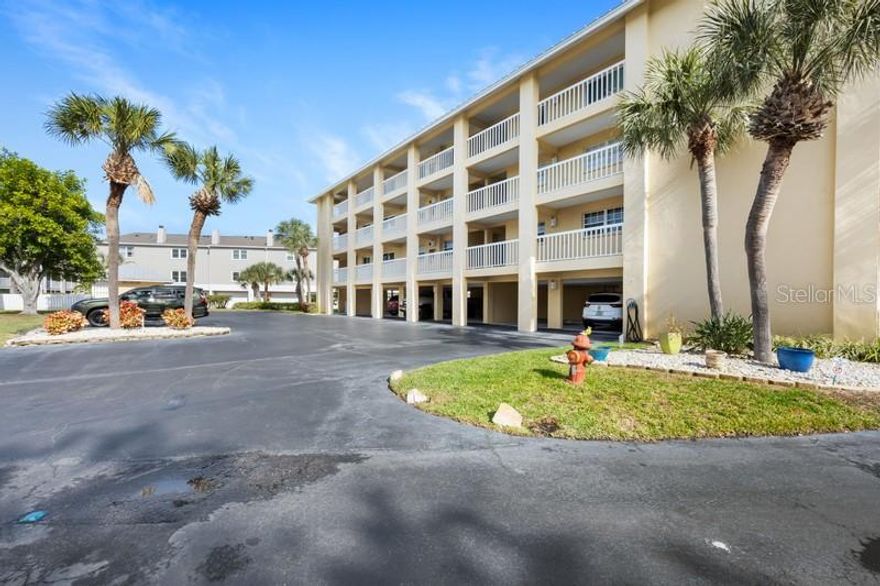 Welcome to the beautiful island of Tierra Verde. You won't want to miss this two bed, two bath waterfront condo with an available boat slip ( Some Restrictions Apply First Come-First Serve). The Old Island Inn is a waterfront resort style community located just a few miles from Fort DeSoto. This updated two bedroom, two bath unit features beautiful water views to Tierra Verde's East canal. The kitchen features granite counters solid wood cabinetry with plentiful storage, a breakfast bar and adjacent dinette looking out to the water. Spacious living room with tile flooring throughout. Step out through the French doors to the expansive balcony and feel the tropical breeze with your morning coffee or evening cocktail and watch manatees and dolphins swim by. The master bedroom features a walk-in closet and ensuite bath. Guest bathroom has a walk in shower. In the hallway of the bedroom wing there is a laundry closet with stacked washer / dryer. Old Island Inn boasts amenities that include a marina / dock area with boat slips, dedicated covered parking space & storage locker, plenty of guest parking, tennis & pickleball courts and an oversized  pool. Downtown Tierra is across the street with local restaurants Tierra Verde is just minutes to I-275, St. Pete Beach, 30 min. to Tampa International Airport; close to shopping, restaurants and just 15 minutes to downtown St. Pete. Tierra Verde has a community park, baseball field, tennis courts, playground, biking and running trails. Two marinas, several restaurants and local shops are all within a short walk. Recreation and adventure await at nearby Fort DeSoto! Enjoy the beach along with fishing, camping, kayaking, paddle boarding and the off leash dog beach and dog park. Tierra Verde was recently rated a top trending travel destination by TripAdvisor for 2024! Boat slips available on a first come basis. Enjoy some of Tampa Bay's best fishing and boating waters right in your backyard. Make your appointment today and start living the island lifestyle you've always wanted!