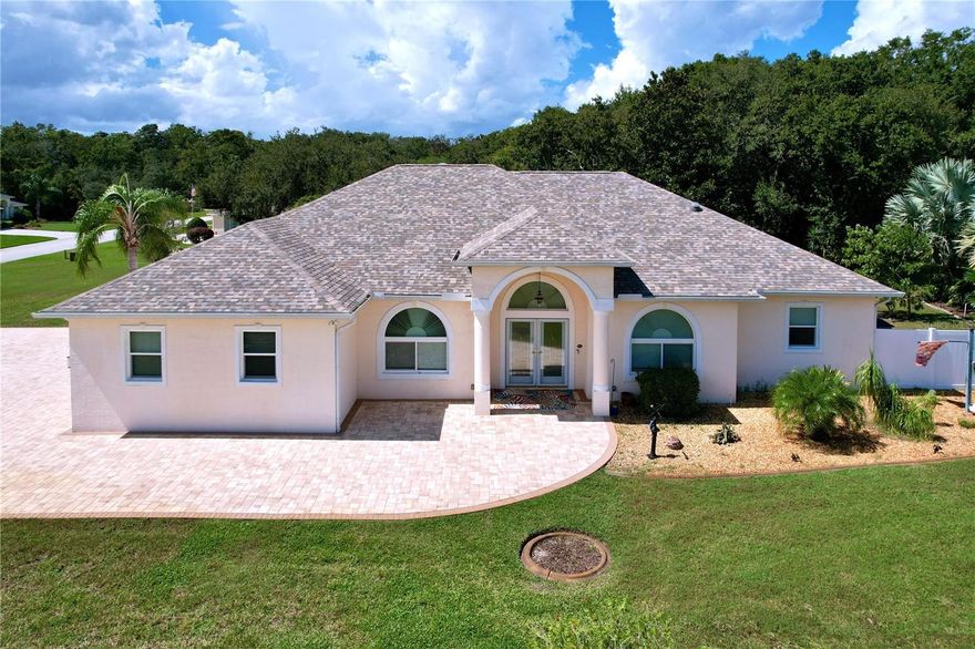 Welcome to your private tropical retreat in the gated Reserve at Golden Acres! This beautifully maintained 3-bedroom, 3-bath pool home with an office is situated on a spacious 2.57-acre conservation lot, offering peace, privacy, and room to spread out. Perfect for multi-generational living, the home features two primary suites, each with private ensuite baths and direct pool access. The bright, open layout flows effortlessly, with multiple living spaces designed for comfort and entertaining. The office provides a versatile space that could easily serve as a 4th bedroom, while numerous skylights fill the home with natural light, creating a warm and inviting atmosphere throughout.

Step outside to your screened-in pool area, featuring a newly resurfaced saltwater pool and a large covered patio, all surrounded by extensive brick pavers — a resort-style setting ideal for gatherings or quiet relaxation. A 3-car garage and upgraded brick paver driveway and parking area provide plenty of space for vehicles, guests, and recreational toys. Enjoy fruit trees, including avocado, lemon, and lime, and a tranquil conservation backdrop that enhances the property’s natural beauty. A 2024 roof and impact rated windows offer peace of mind, and the oversized, fenced lot gives you endless possibilities — from gardening to outdoor hobbies.

Nestled in the desirable gated Reserve at Golden Acres, this home combines privacy with easy access to shopping, dining, medical facilities, and the Gulf Coast’s best beaches. Don’t miss this rare opportunity — schedule your private tour today!