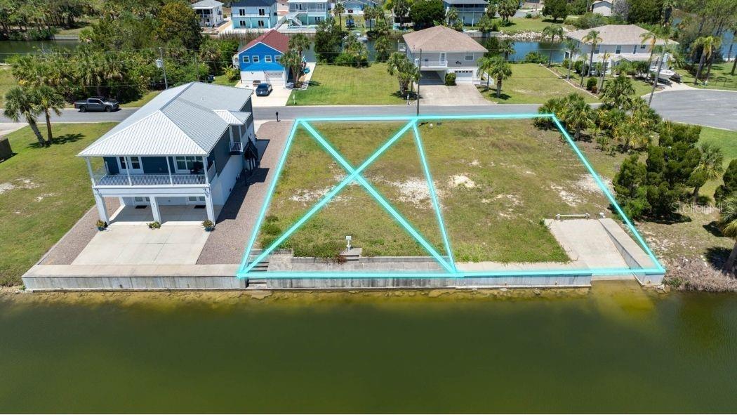Build Your Dream Home in Waterfront Hernando Beach! This prime 50x100 (5,000 SF) lot offers has a BRAND NEW SEAWALL AND BOAT RAMP, indirect Gulf access, and is the perfect canvas for your custom-built retreat. Located in the heart of Hernando Beach, this lot is surrounded by the stunning Weeki Wachee Preserve and just minutes to Weeki Wachee Springs and the Weeki Wachee River.
This property has no HOA or deed restrictions, and short-term rentals are allowed—making it ideal for investors or seasonal owners. Zoned R1B, it's perfect for a single-family home, with water, sewer, and electric connections already available at the street. Please note: the lot is located in a flood zone, so any new home must be elevated.
Enjoy boating, kayaking, fishing, and paddleboarding right from your backyard. Just a short ride to the Hernando Beach Flats, Anclote Key, or the Homosassa River. This golf cart-friendly community offers easy access to shopping, dining, entertainment, and the Suncoast Parkway for a convenient commute to Tampa and beyond.
Don’t miss this rare opportunity to own a slice of Florida’s Gulf Coast paradise!
(Lot next door also available.)