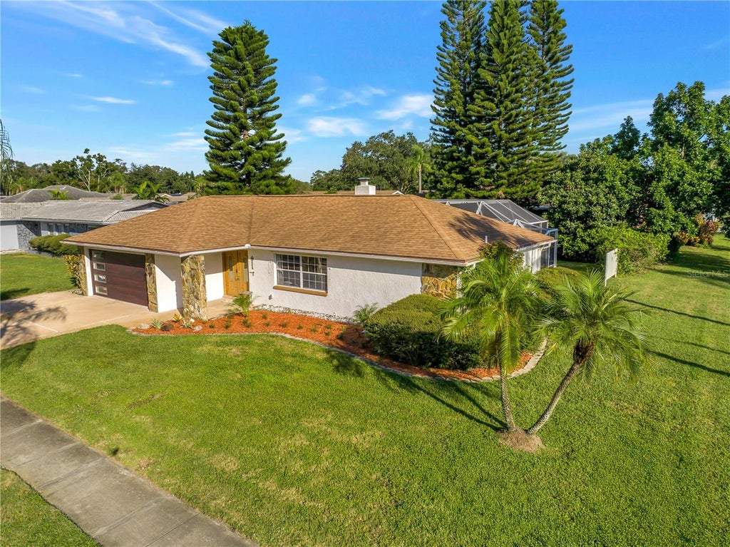 Photo of 2079 Egret Drive, Palm Harbor, FL 34683 (MLS # TB8556584)
