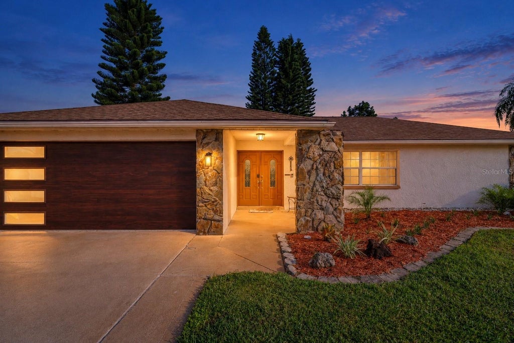 Photo of 2079 Egret Drive, Palm Harbor, FL 34683 (MLS # TB8556584)