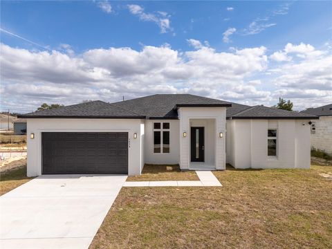 Photo of 1438 Sarasota Drive, Kissimmee, FL 34759 (MLS # O6328982)