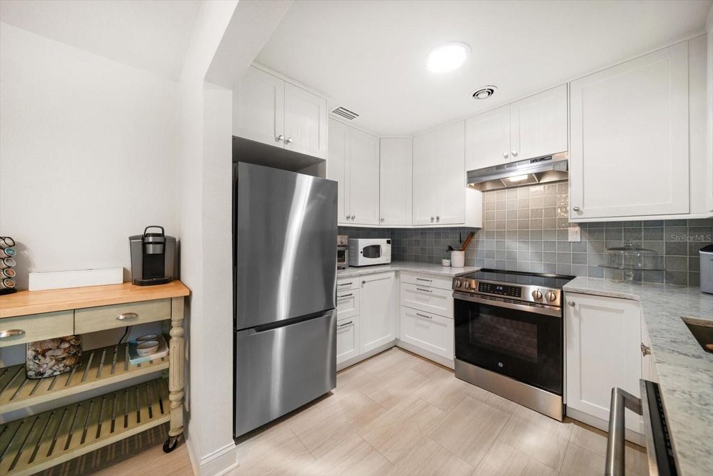Photo of 745 Bruce Avenue, Clearwater Beach, FL 33767 (MLS # TB8401585)