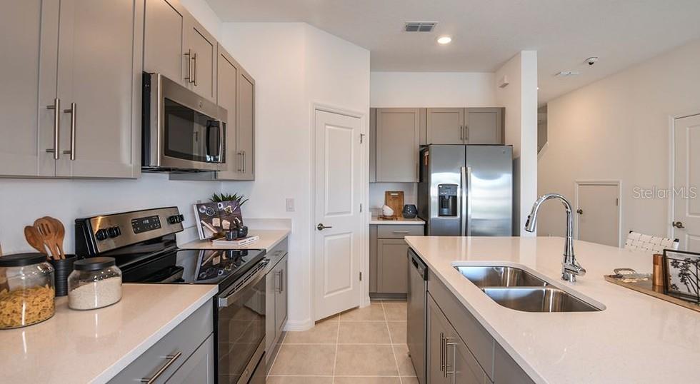 TOWNHOMES AT AZARIO - Residential