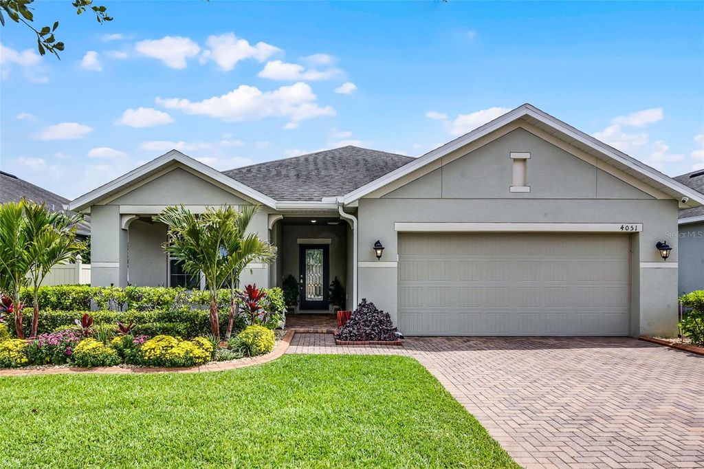 Photo of 4051 Prairie Reserve Boulevard, Orlando, FL 32824 (MLS # O6363628)