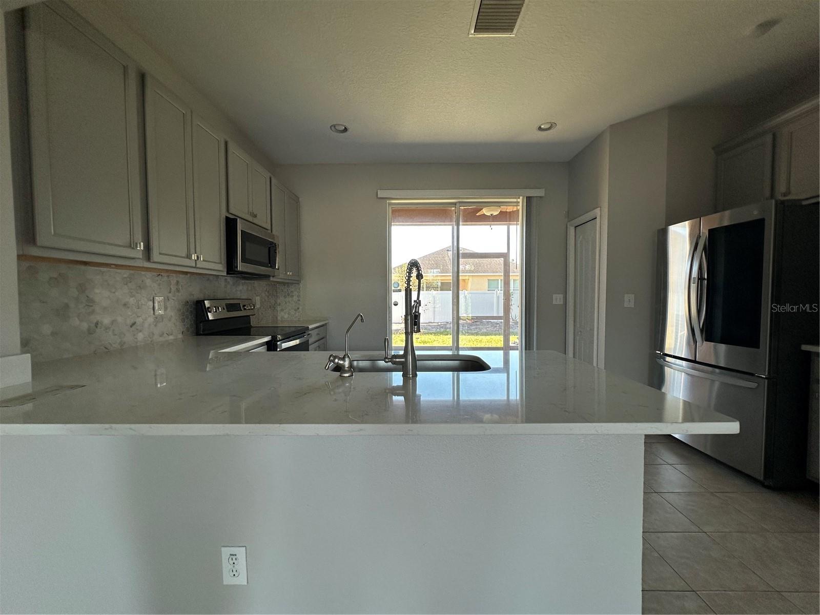 6950 TOWERING SPRUCE DRIVE