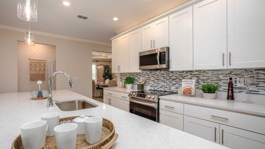 Photo of 65 Bells Of Ireland Court, Homosassa, FL 34446 (MLS # O6391292)