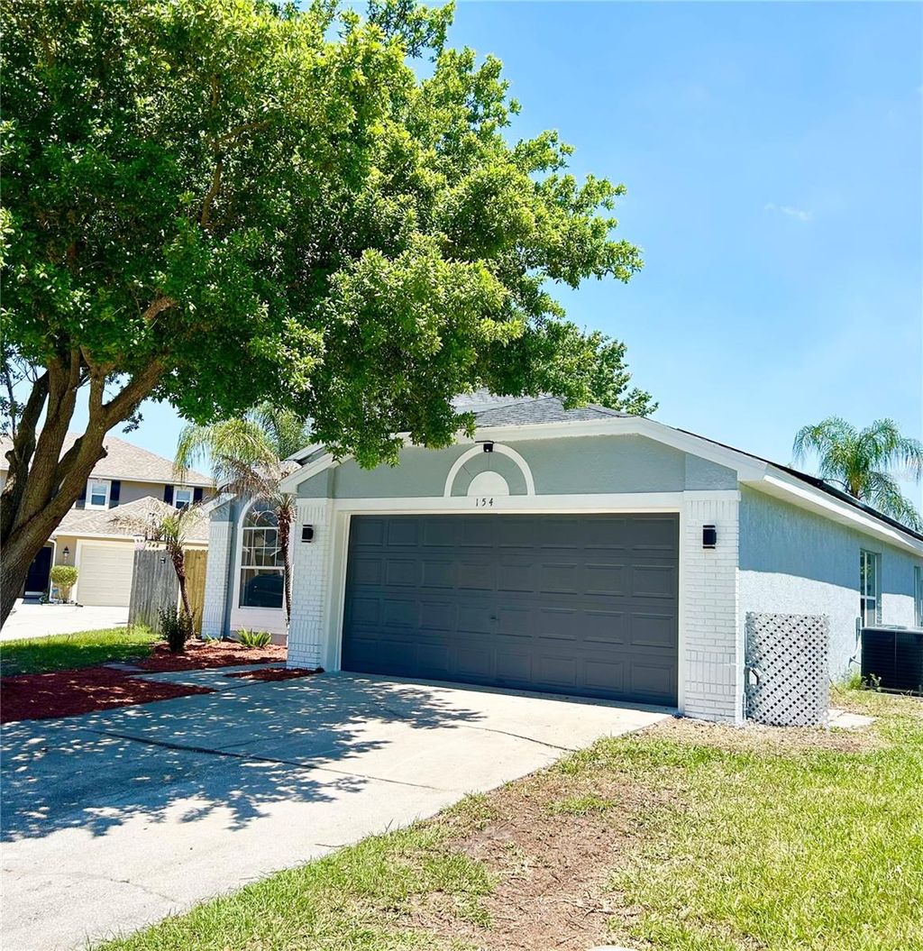 Photo of 154 Woodbury Pines Circle, Orlando, FL 32828 (MLS # O6396025)