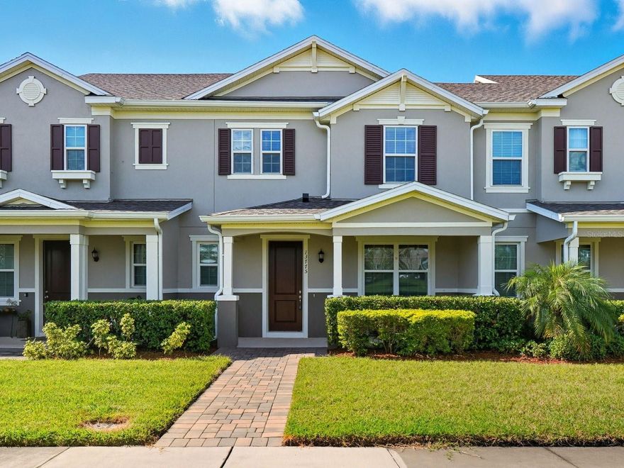 LIKE NEW 3 bedrooms 2.5 bathrooms TOWNHOME in sought after VINEYARDS OF HORIZON WEST in WINDERMERE. An inviting Front porch guides you in the luminous home, light grey Luxury Vinyl covers the first floor and all bathrooms, grey carpet covers the upstairs. Kitchen is spacious and comfortable, featuring a generous island, granite countertops and stainless-steel appliances. Also on the first floor is the laundry room and access to the 2-car garage and fenced patio. Garage is accessed from the back street, so the front of the house features a nice wide porch to sit and relax. The second floor features a small loft and three bedrooms and two bathrooms. Both bathrooms have two sinks and granite countertops. The primary bathroom features a shower while the other features a shower and bathtub combination. The primary bedroom and the second bedroom feature walking closets and the third bedroom is a built-in closet. High ceilings allow for excellent light dispersion throughout the home.  Close to shopping, restaurants are literally 2 minutes away.