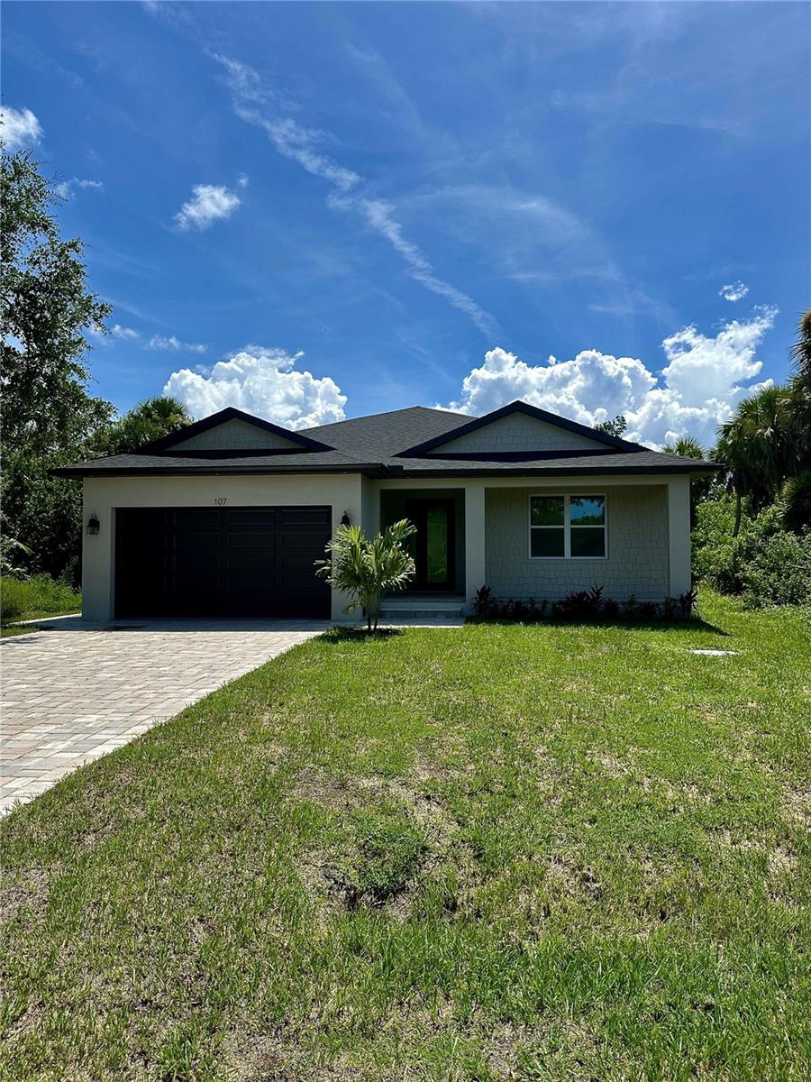 This unique, custom-built home offers the perfect blend of modern design and private tranquility, nestled in an undeveloped cul-de-sac in the rapidly expanding community of Rotonda, FL. Set apart from the hustle and bustle, this home boasts an expansive open floor plan with plenty of room to grow and entertain. Key features include: Open Layout: The spacious design flows effortlessly from room to room, creating an inviting atmosphere perfect for family gatherings or peaceful relaxation. Premium Finishes: Built with attention to detail by a renowned quality builder, this home includes luxurious solid wood cabinets throughout, adding an elegant touch to every room. Spacious Rooms: Generously sized bedrooms and living spaces provide both comfort and functionality, offering ample spacefor all your needs. Spa-Inspired Bathrooms: Large, spa-like bathrooms with walk-in showers provide a retreat from the everyday, combining convenience and luxury. Durable Luxury Vinyl Flooring: Easy to maintain and visually appealing, the luxury vinyl floors offer durability while enhancing the home's overall aesthetic. With its prime location in a peaceful, undeveloped area, this one-of-a-kind home gives you both the serenity of private living and the benefits of being in a fast-growing area with plenty of future potential. Don’t miss your chance to own this beautiful home!