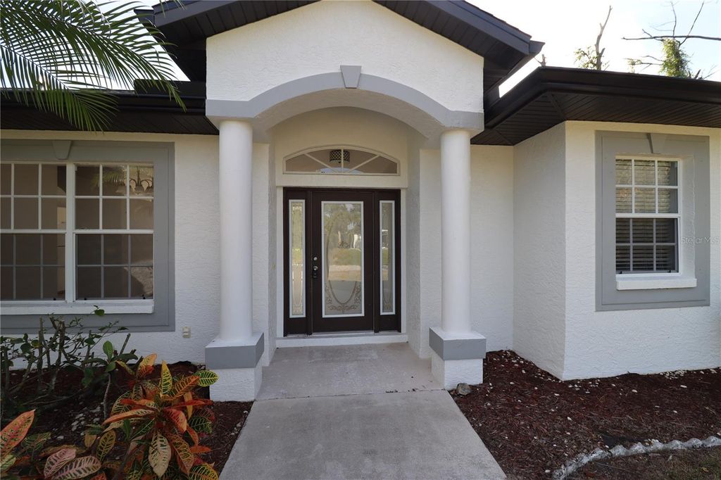 Photo of 2595 Snowflake Lane, North Port, FL 34286 (MLS # A4669914)