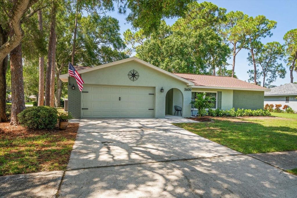 Photo of 3600 Fairway Forest Circle, Palm Harbor, FL 34685 (MLS # TB8469170)