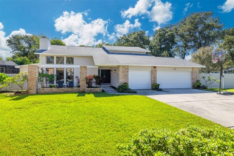 Photo of 1496 Treetop Drive, Palm Harbor, FL 34683 (MLS # TB8560800)