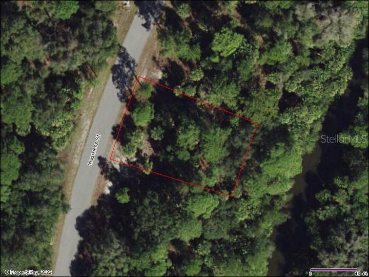 Beautiful, wooded, freshwater canal lot located in the heart of North Port. Drink your morning coffee, kayak, paddleboard, or watch gorgeous Florida sunsets from your very own back yard waterway. If you are thinking of building or investing in real estate, this may be the perfect property for you. Close to boating, fishing, shopping, beaches, restaurants, schools, public boat ramps and area attractions. Adjacent lot (78) is available for sale on a separate listing.