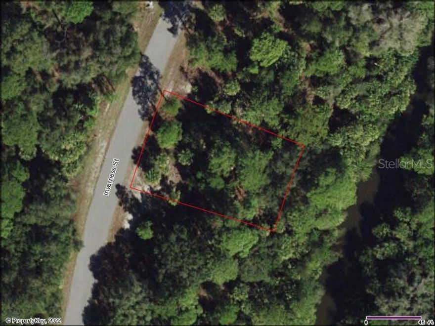 Beautiful, wooded, freshwater canal lot located in the heart of North Port. Drink your morning coffee, kayak, paddleboard, or watch gorgeous Florida sunsets from your very own back yard waterway. If you are thinking of building or investing in real estate, this may be the perfect property for you. Close to boating, fishing, shopping, beaches, restaurants, schools, public boat ramps and area attractions.  Adjacent lot (78) is available for sale on a separate listing.