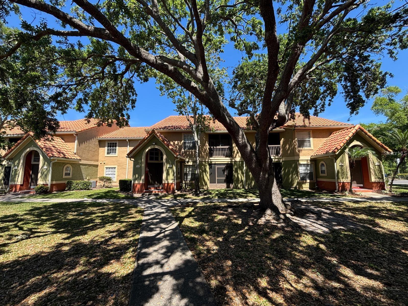 Dreams Do Come True! Spectacular FOR RENT or SALE the perfect blend of comfort and convenience in this charming 2-bedroom, 2-bathroom first-floor condo located in the gated community of Bella Vista. Beginning with stylish Tile roof Designed with a split floor plan, this home offers privacy and functionality, with each bedroom featuring its own en-suite bathroom. Step inside to an open-concept living space highlighted by tile flooring, a modern kitchen with granite countertops, and stainless steel appliances. Enjoy your morning coffee or unwind in the evening on the screened lanai, which also offers additional storage. Remodeled Bathrooms and New Fresh Paint throughout make this a Gem! Bella Vista provides resort-style amenities, including a sparkling community pool, tennis courts, a playground, a grill area, and more. Ideally situated in the heart of Kissimmee, you're just minutes from downtown, shopping, dining, The Loop, and world-famous attractions like Disney theme parks. Whether you're searching to rent or for your first home or a prime investment opportunity, this condo is an exceptional find. The owner paid monthly HOA covers water, sewer, exterior maintenance (including the roof and landscaping, and access to all common facilities, ensuring a worry-free lifestyle. Don't miss out—schedule your private showing today!