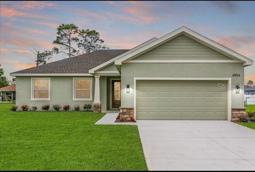 Under Construction. This 4-bedroom, 2-bath home with a 2-car garage is designed for both comfort and connection, featuring vaulted ceilings and an open floor plan that seamlessly blends living, dining, and kitchen spaces. The chef-inspired kitchen, complete with stainless steel finish appliances, allows you to prepare meals while staying engaged with your guests. A thoughtful split-floor plan ensures the primary suite is set apart for privacy, creating a peaceful retreat from the secondary bedrooms. Stylish, functional, and perfect for entertaining, this home is ideal for modern Florida living.