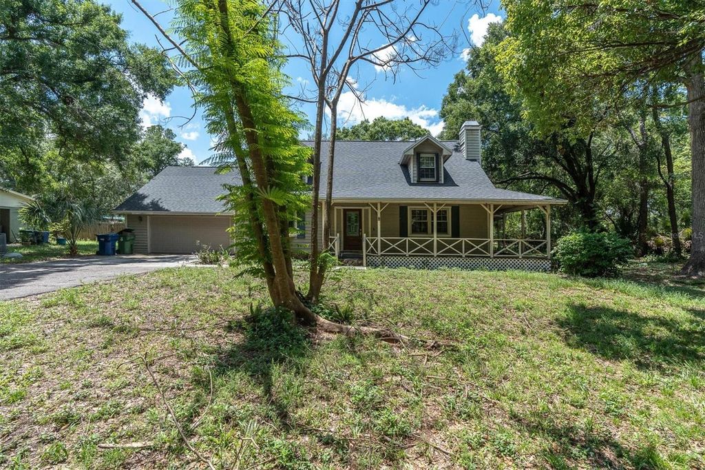 Photo of 10422 N Woodmere Road, Tampa, FL 33617 (MLS # TB8510054)