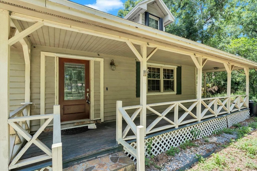 Photo of 10422 N Woodmere Road, Tampa, FL 33617 (MLS # TB8510054)
